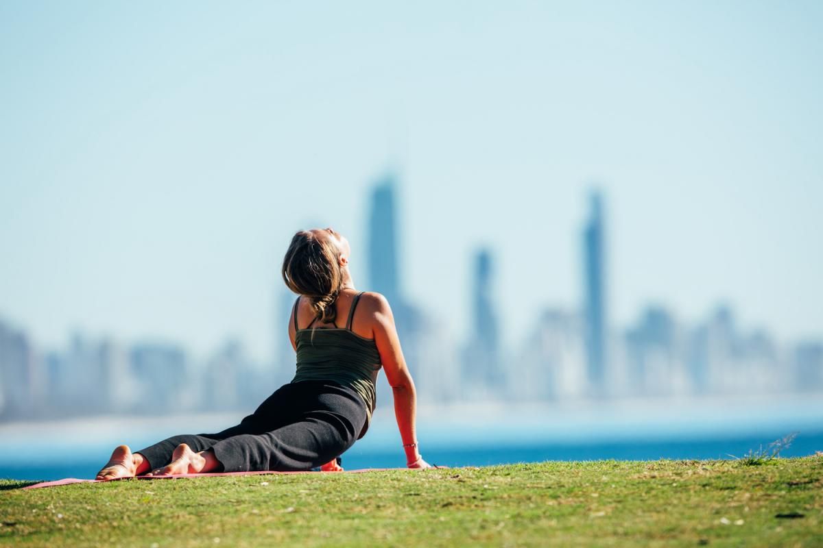 Burleigh Heads Hill woman exercising stretching (image supplied)