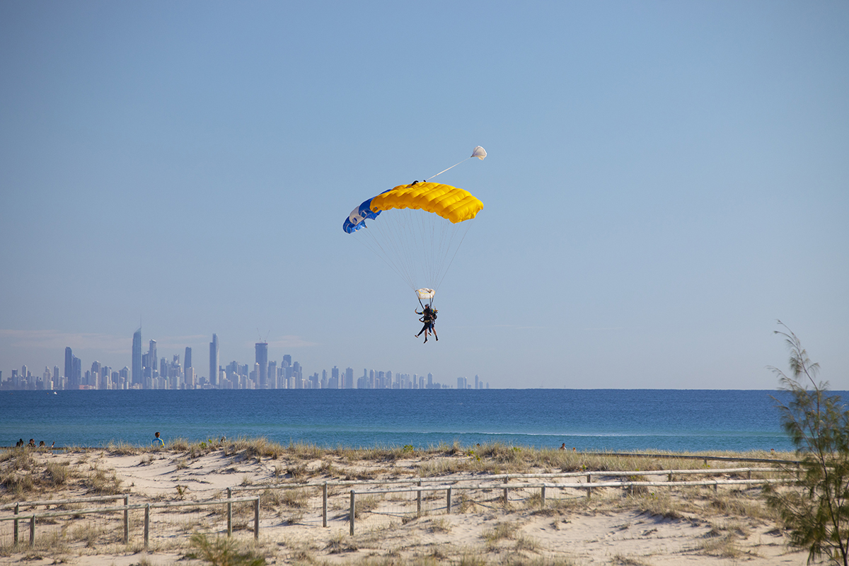 Skydivers landing on Kira Beach, GC Skydive (image courtesy of Destination Gold Coast)