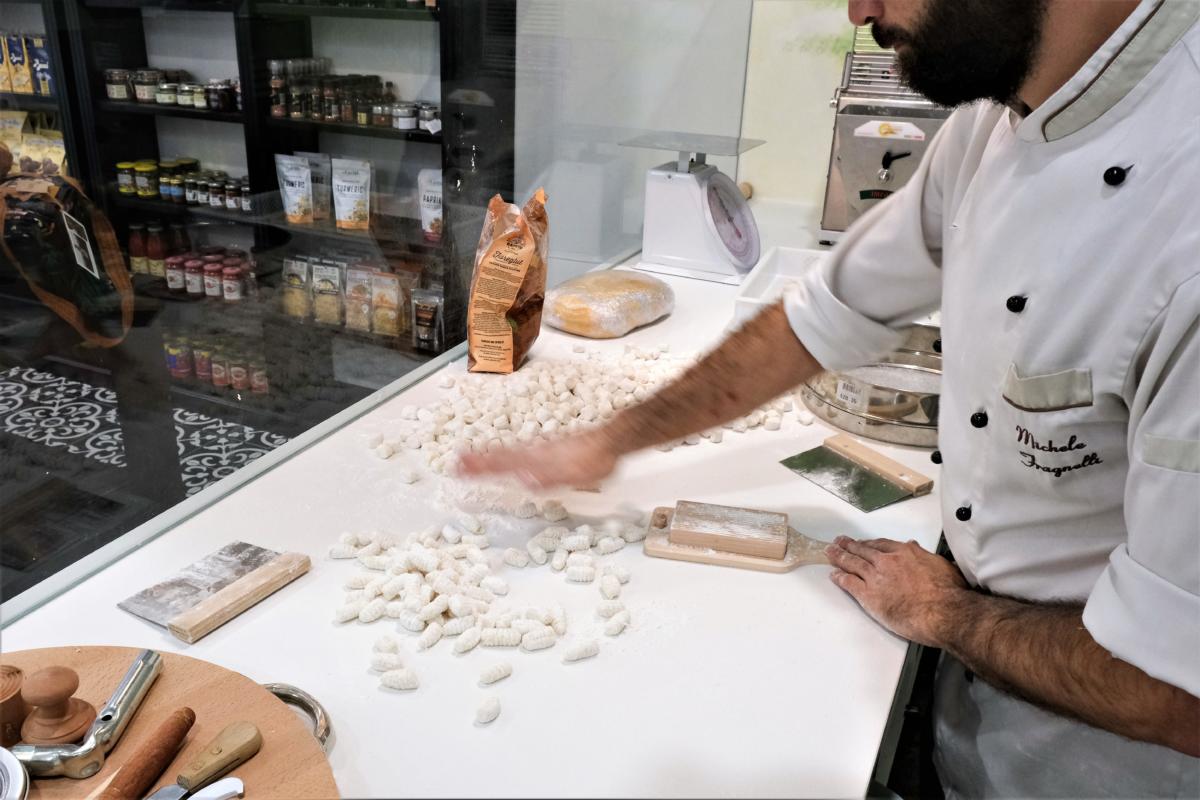 Michelle hands gnocchi rolls, The Pasta Emporium (Photo: © 2021 Inside Gold Coast)