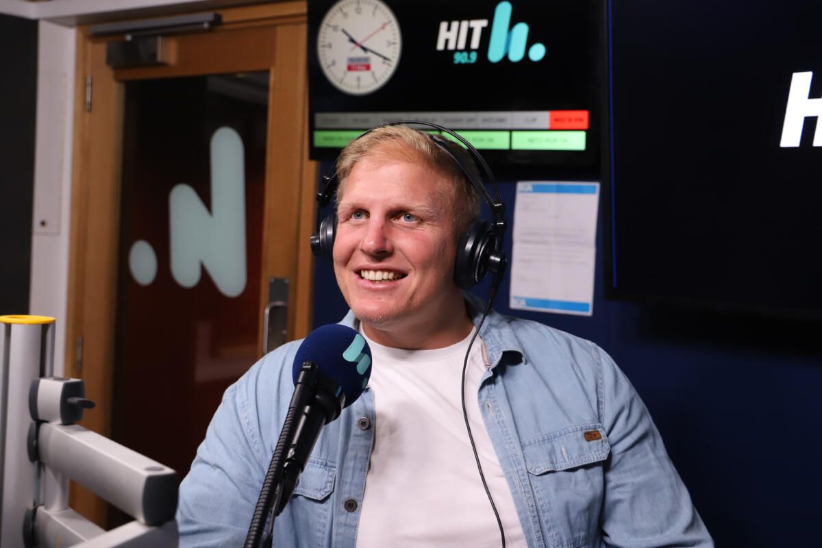 Ben Hannant in the Hit90.9 studio (image supplied)