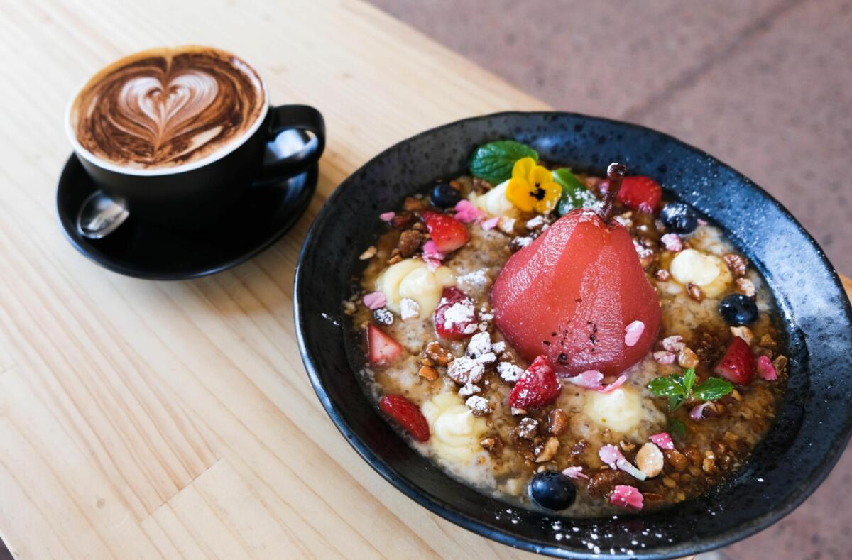 Hibiscus poached pear in Chia porridge and nut crumble at Sweet Bambino (Image: © 2021 Inside Gold Coast)