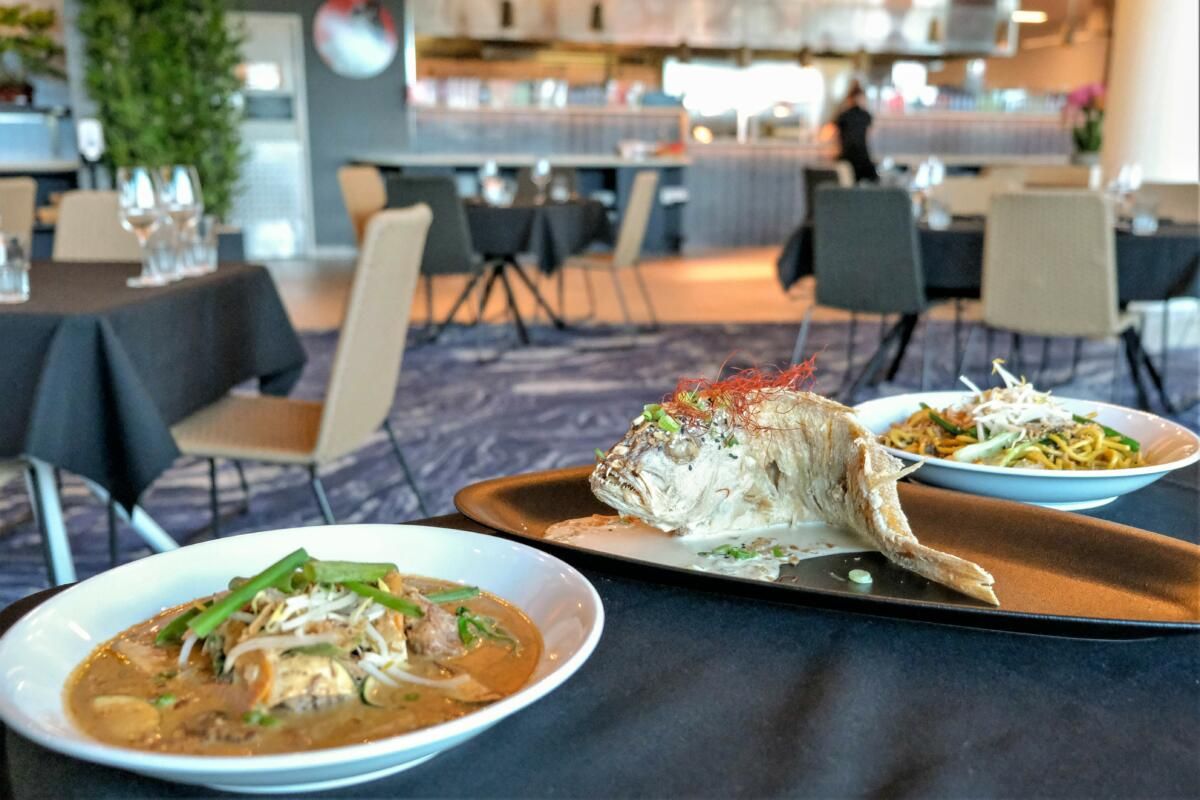 Braised Beef Massaman and Whole Fried Fish with coconut and tamarind sauce, Madame Za (Image: © 2021 Inside Gold Coast)