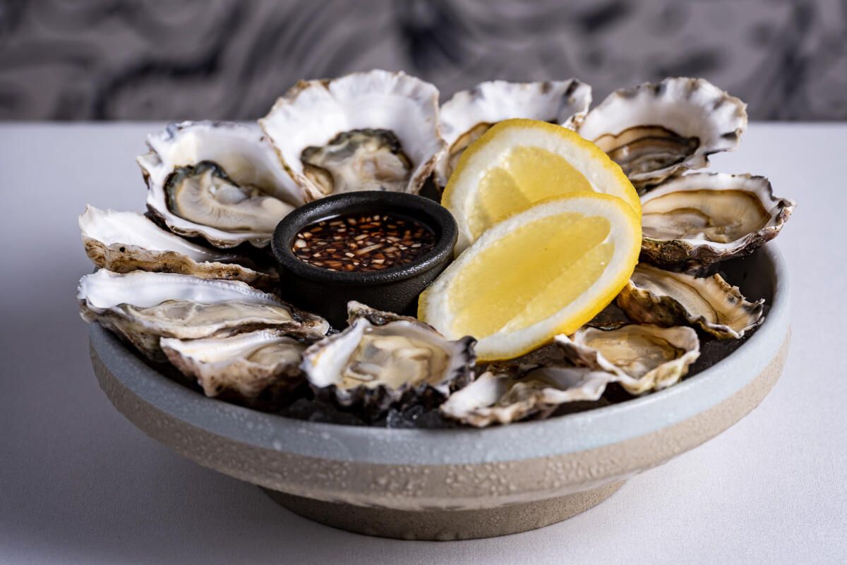 Freshly shucked oysters, mignonette, lemon from Gods of the Sea, Marina Mirage (image supplied)