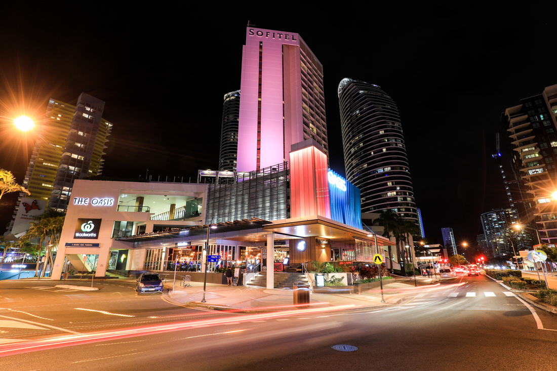 Exterior view of The Oasis centre from Surf Parade at night (image courtesy of Destination Gold Coast)