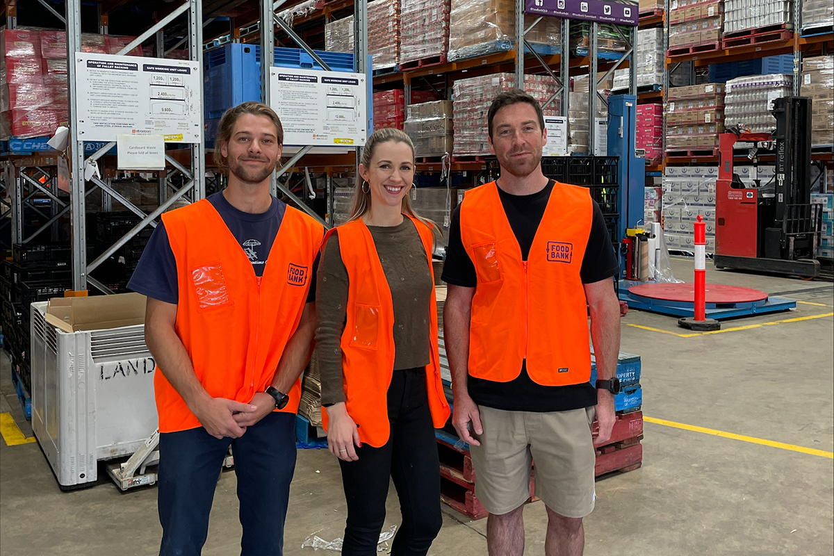 Aaron and Adrian touring the Food bank Queensland Food Distribution Centre in Brisbane (image supplied)