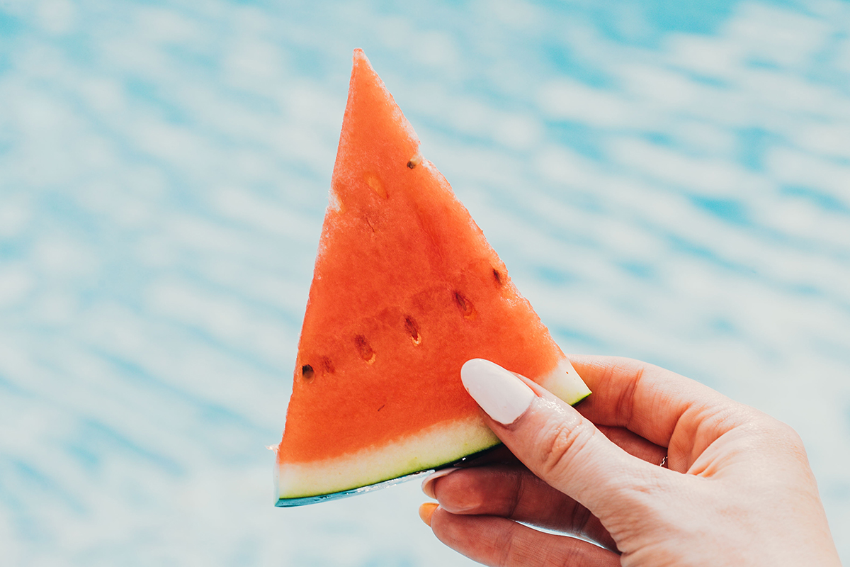 Watermelon by the pool (image via Unsplash)