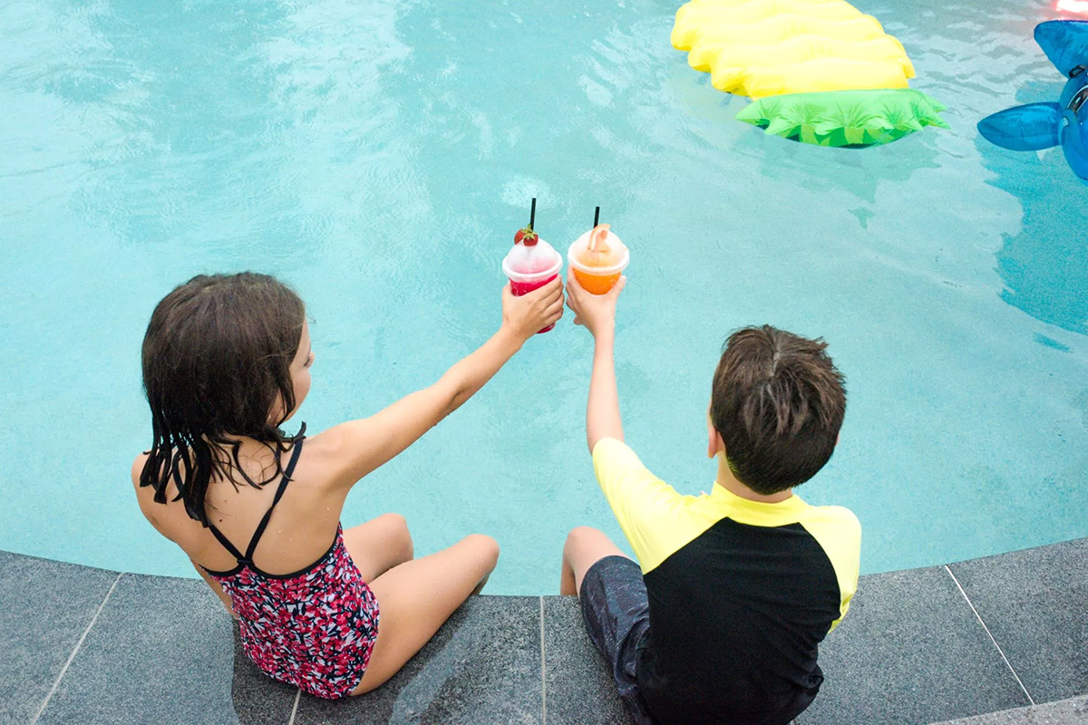 Kids by the pool at the Novotel Surfers Paradise (image supplied)