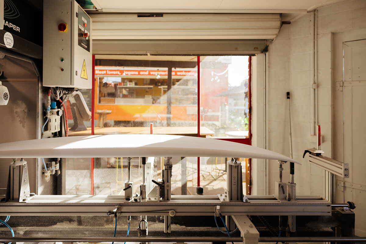 Surfboard being shaped next to La Cha Cha Cabana, Nev Customs Surfboards (Image: © 2025 Inside Gold Coast)